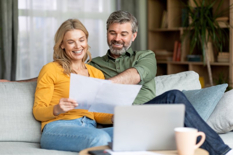 Couple managing their finances together at home